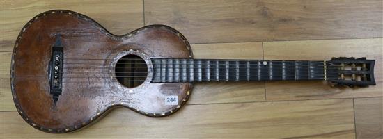 An antique guitar, label for J. Turner